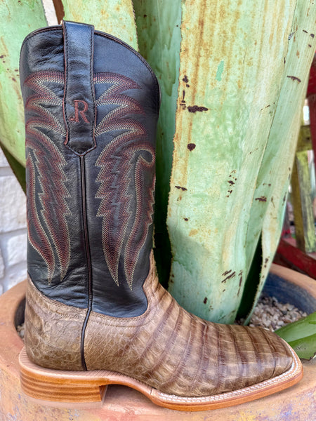 Men’s R. Watson Western Boot in brown, with a coco caiman belly vamp offering rugged texture, espresso leather shaft with 10-row stitch pattern, all-leather stacked walking heel, wide square toe, and hand-pegged leather outsole – RW2004-2. Available at Blair’s Western Wear, Marble Falls, TX.