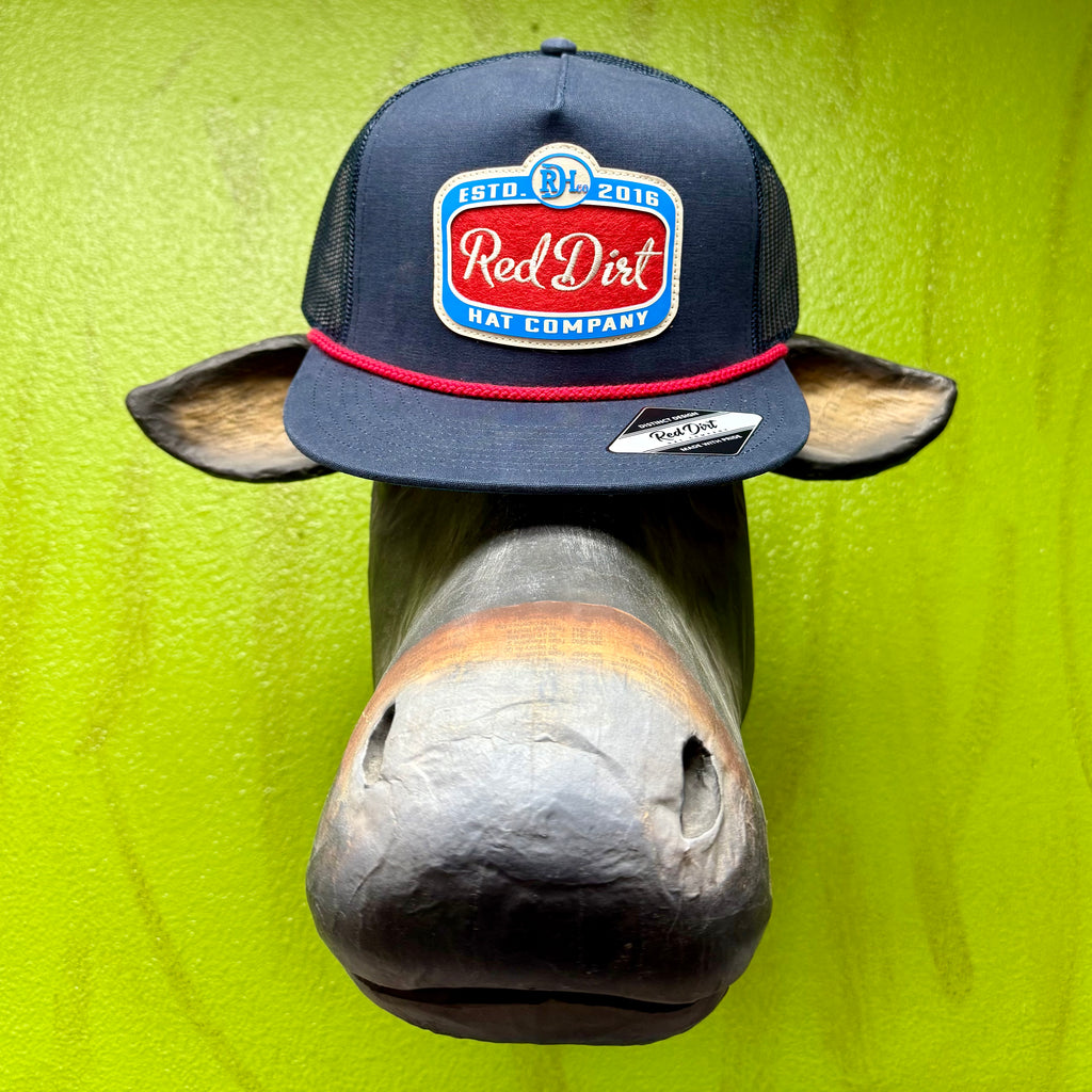 Men’s Red Dirt Hat Co. mesh “Gitty Up” cap in navy with red rope accent, structured five-panel front, and breathable mesh back - RDHC519. Available at Blair's Western Wear, Marble Falls, TX.