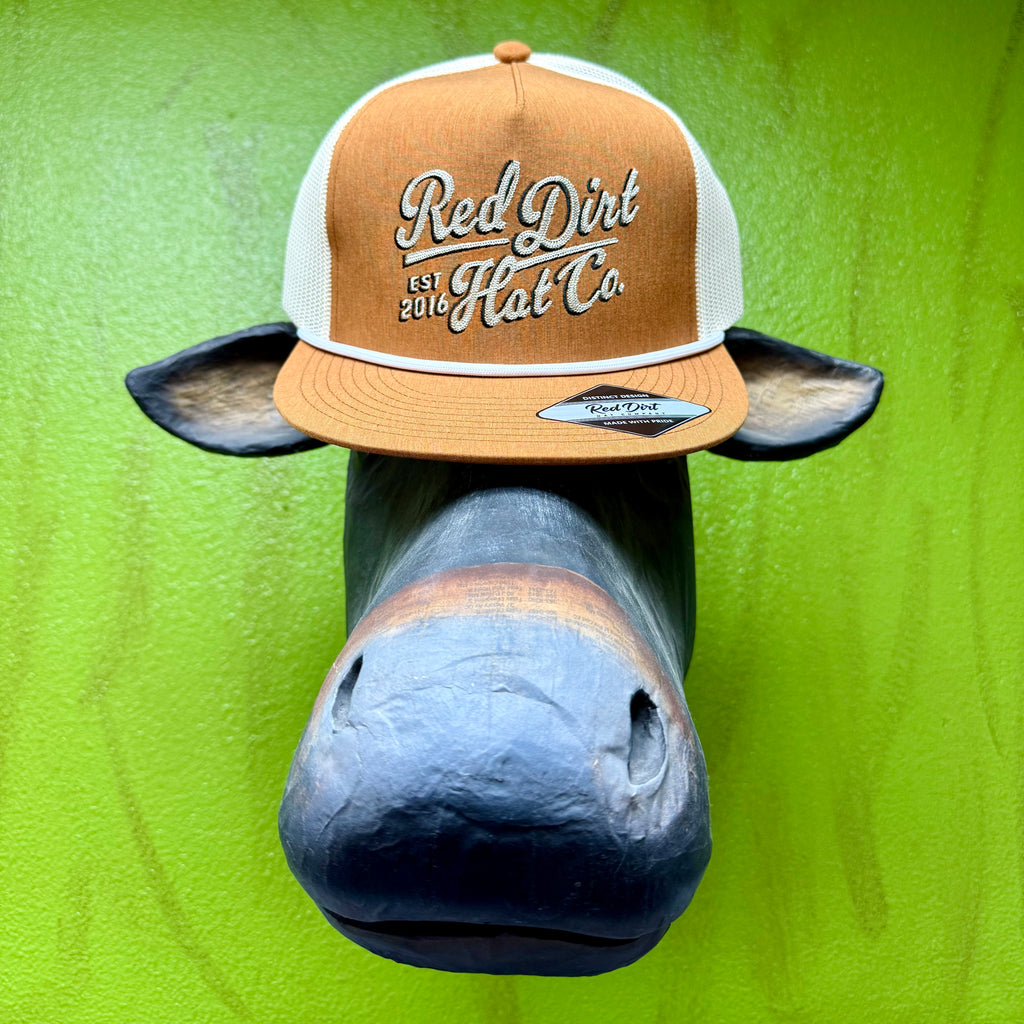 Men’s Red Dirt Hat Co. mesh snapback cap in orange with natural mesh back, featuring a flat bill with rope trim and raised embroidered logo – RDHC448. Available at Blair’s Western Wear, Marble Falls, TX.