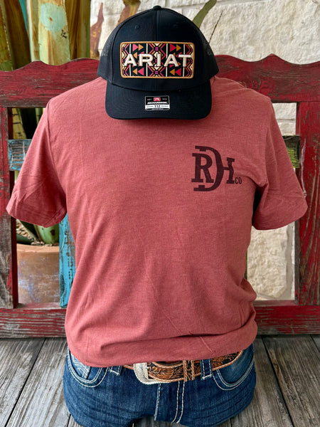 Men’s Red Dirt Hat Co. short-sleeve graphic tee in red brick, built from soft lightweight fabric, with a large arrowhead mountain graphic on the back – RDHCT191. Available at Blair's Western Wear, Marble Falls, TX.