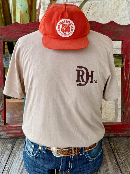 Men’s Red Dirt Hat Co. short sleeve graphic tee in tan/orange, featuring a lightweight cotton-blend feel, with a bold Buffalo Cactus back graphic - RDHCT192. Available at Blair's Western Wear, Marble Falls, TX.