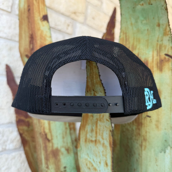 Black mesh trucker cap shown from the back, featuring a black adjustable strap and a small light blue embroidered logo on the side with RDH