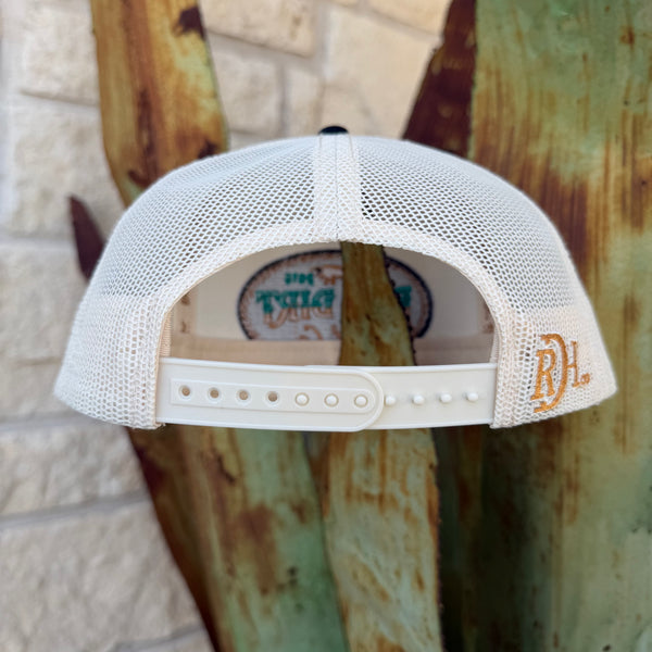 Men's Red Dirt Hat Co. Turquoise &amp; Gold Logo Cap— RDHC-556 Clean contrast, bold logo. This Red Dirt Hat Co. trucker pairs a cream structured front and mesh back with a sharp black brim and teal rope cord — anchored by a standout oval patch that looks intentional from every angle