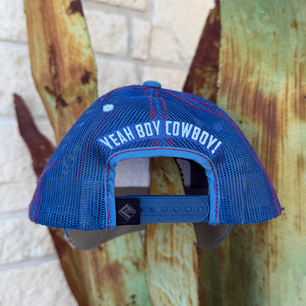 A blue mesh trucker cap with red stitching and white text reading 'YEAH BOY COWBOY!' on the back, 