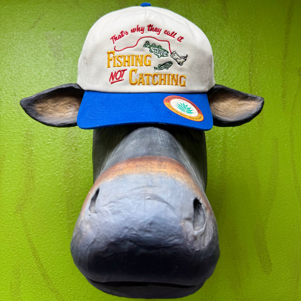 Men's Seager Fishing structured snapback cap in white and blue, breathable mesh backing for ventilation, with adjustable snapback closure for a custom fit - NOT CATCHING. Available at Blair's Western Wear, Marble Falls, TX.