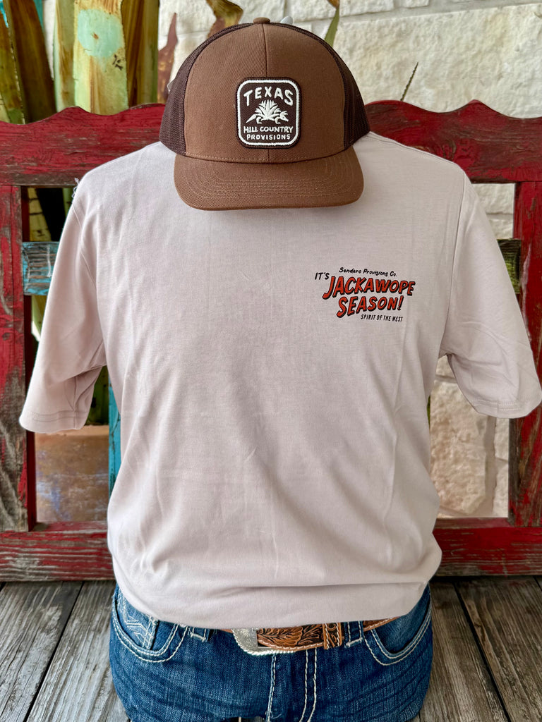 Men’s Sendero Provisions Co. graphic short sleeve t-shirt in tan with brick-red “Jackalope Season” design, breathable cotton fabric, and bold back graphic print - SPCS125F11. Available at Blair's Western Wear, Marble Falls, TX.