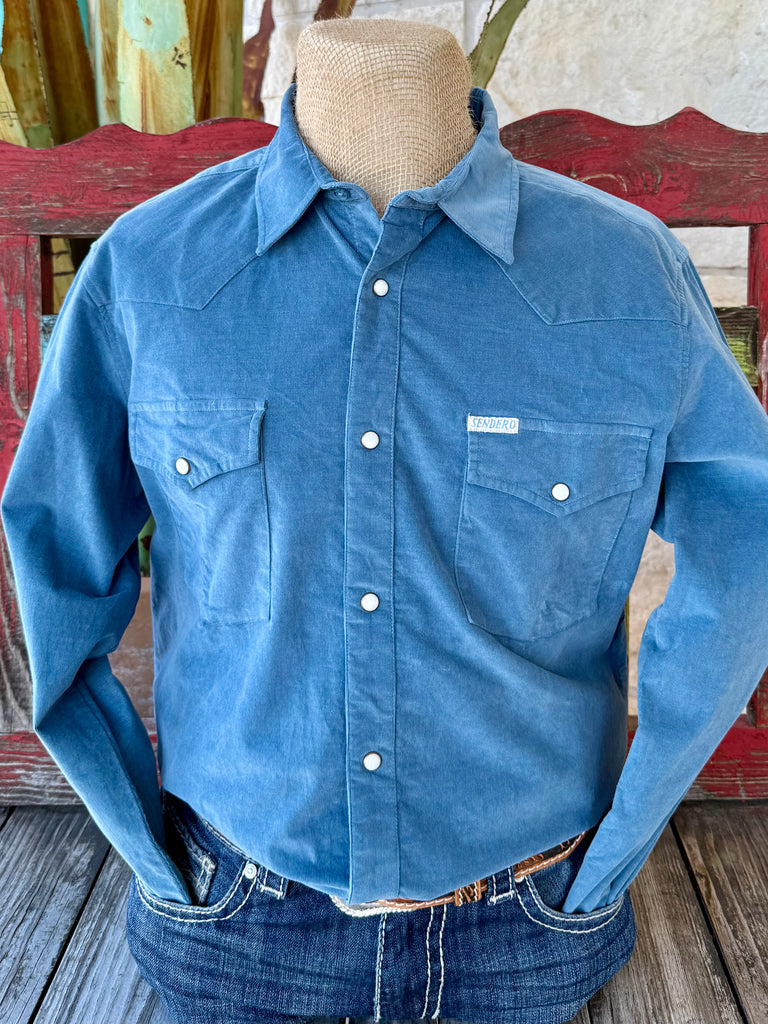 Men’s Sendero Provisions Co. Western Shirt in blue corduroy, made from soft fine-wale fabric, with pearl snap front and dual chest pockets – SPCS52210D. Available at Blair’s Western Wear, Marble Falls, TX.