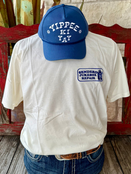 Men’s Sendero short sleeve jukebox repair t-shirt in natural/blue, crafted from soft cotton for all-day comfort, with bold retro jukebox back graphic - JUKEBOX. Available at Blair's Western Wear, Marble Falls, TX.