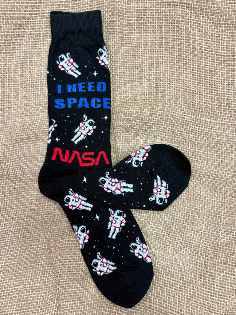 Men’s Socksmith NASA astronaut crew socks in black, made with a soft cotton blend for comfort, with reinforced heel and toe for long-lasting wear - MNC2648. Available at Blair's Western Wear, Marble Falls, TX.