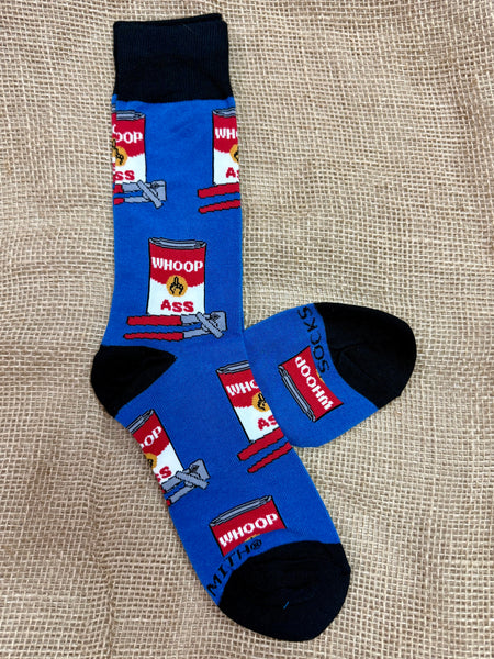 Men’s Socksmith novelty crew socks in blue, featuring a “Can of Whoop Ass” design, with reinforced heel and toe, and soft cotton-blend comfort - MNC3038. Available at Blair's Western Wear, Marble Falls, TX.