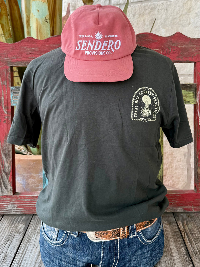 Men’s THC Provisions short sleeve cactus scene t-shirt in olive with yellow desert graphic, soft cotton for breathable comfort, with fade-resistant print for lasting style - SACRED GROUND. Available at Blair's Western Wear, Marble Falls, TX.