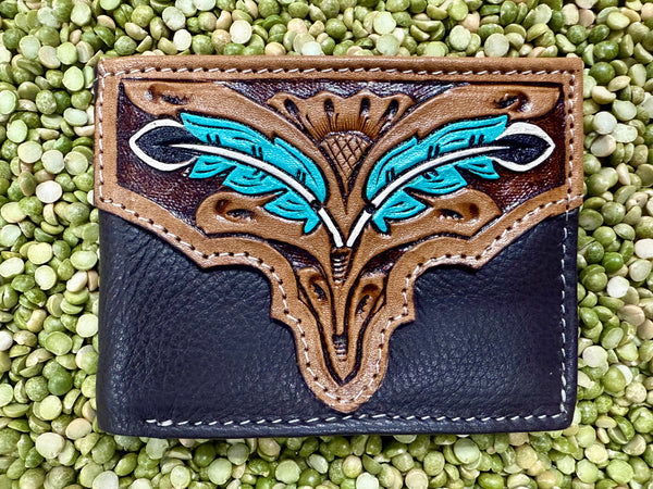 Men’s Tackrus Challenger bifold leather wallet in black and brown with hand-tooled turquoise feather design, durable genuine leather, and multiple card slots with ID window - 18FKW59. Available at Blair's Western Wear, Marble Falls, TX.
