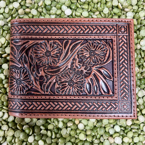 Men's Tony Lama Leather Bifold Wallet in brown, floral tooling design with durable stitching - 24153138W1. Available at Blair's Western Wear, Marble Falls, TX.