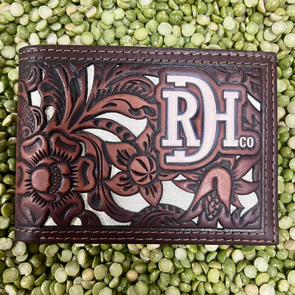 Men's Tradition Leather Bifold Wallet in brown and white, features embossed detailing and multiple card slots - 24170881W1. Available at Blair's Western Wear, Marble Falls, TX.