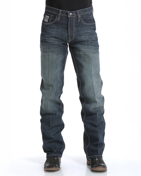 The Cinch White Label Jean delivers classic cowboy comfort with its relaxed fit, mid-rise waist, and durable dark stonewash denim. Built to move and made to last, it slides easily over boots and stays tough through every job, ride, or weekend out. Men's White Label Jean - 92834019. Available at BLAIR'S Western Wear located in Marble Falls TX.
