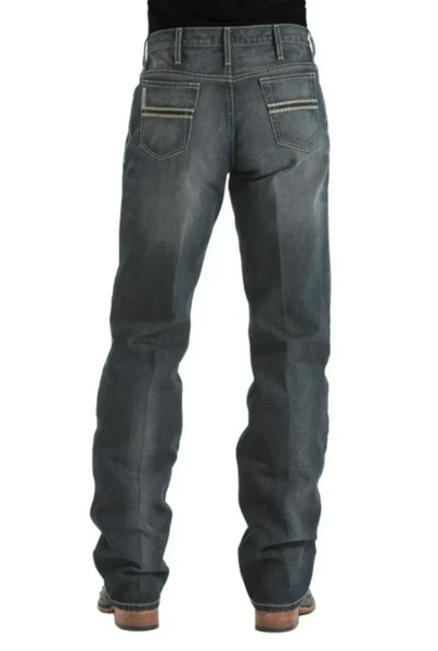 The Cinch White Label Jean delivers classic cowboy comfort with its relaxed fit, mid-rise waist, and durable dark stonewash denim. Built to move and made to last, it slides easily over boots and stays tough through every job, ride, or weekend out. Men's White Label Jean - 92834019. Available at BLAIR'S Western Wear located in Marble Falls TX.
