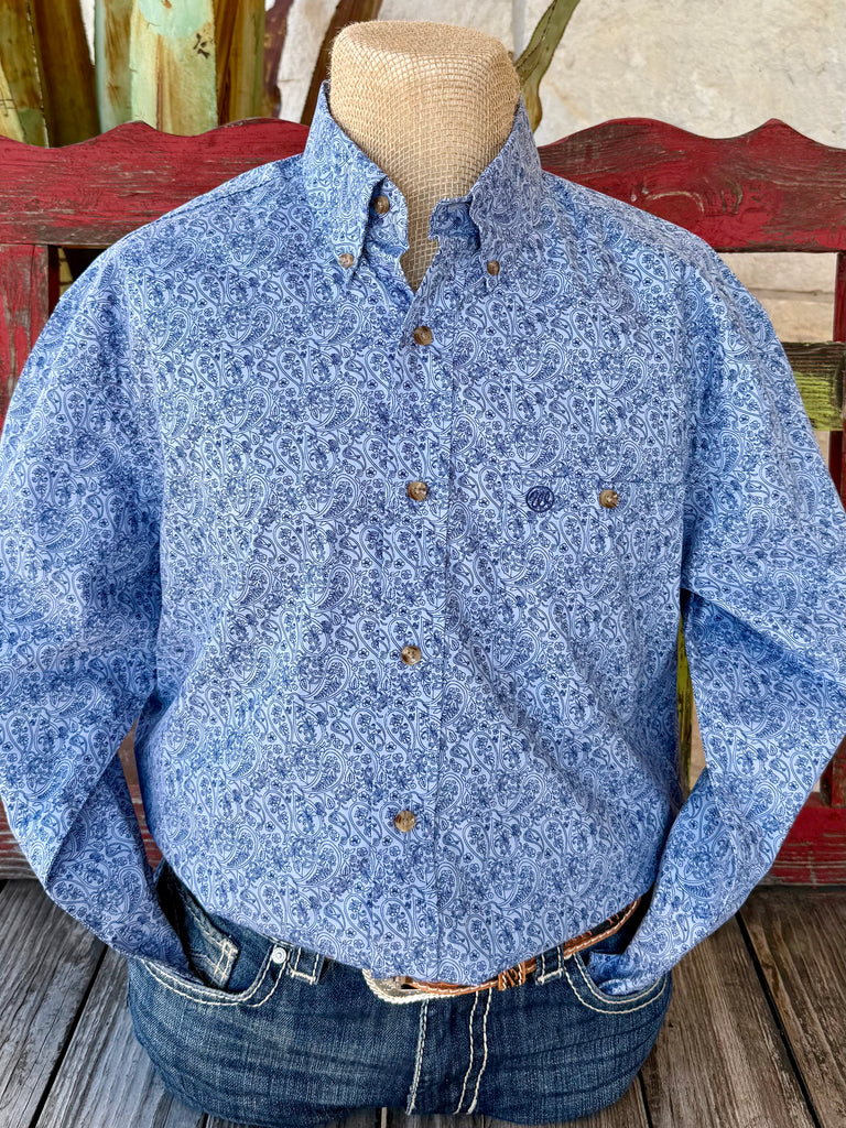 Men’s Wrangler western shirt in blue paisley print, made from a soft cotton-poly blend with button-down collar and adjustable cuffs – 112369441. Available at Blair’s Western Wear, Marble Falls, TX.
