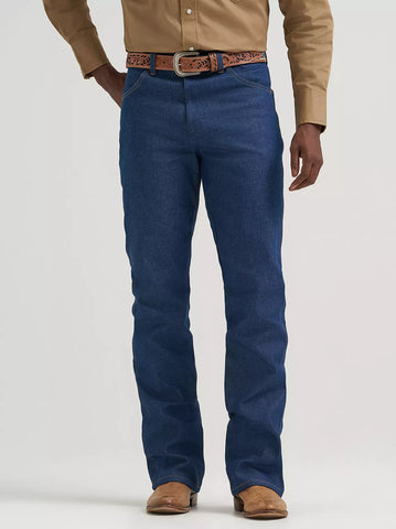Men’s Wrangler boot cut regular jeans in navy, durable midweight denim for everyday wear, with boot cut leg that fits comfortably over western boots - 945NAV. Available at Blair's Western Wear, Marble Falls, TX.