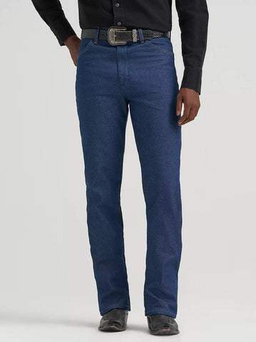 Men’s Wrangler Boot Cut Slim Jeans in Navy, slim fit through seat and thigh for a modern look, with boot cut leg opening designed to fit over boots - 935NAV. Available at Blair's Western Wear, Marble Falls, TX.