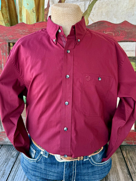 Men’s Wrangler long sleeve button-down shirt in burgundy, made from durable cotton poplin, with chest pocket and embroidered logo – 112369627. Available at Blair’s Western Wear, Marble Falls, TX.