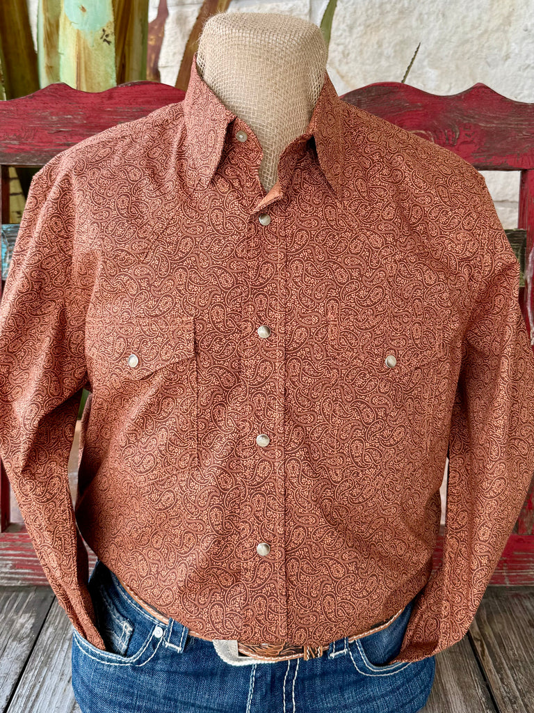 Men’s Wrangler long sleeve snap print shirt in rust paisley, featuring pearl snap closures, with dual chest pockets for storage - 112367925. Available at Blair's Western Wear, Marble Falls, TX.