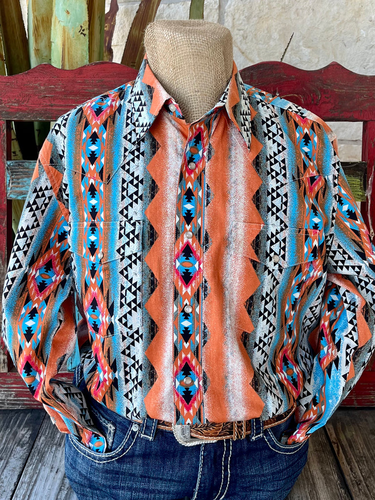 Men’s Wrangler Western Shirt in orange, turquoise, and black Aztec print, featuring pearl snap buttons and dual flap chest pockets – 112365887. Available at Blair's Western Wear, Marble Falls, TX.