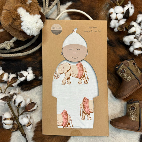 Milkbarn Newborn Gown & Hat Set that is white with elephant wearing tutus; the material it is made of is rayon from bamboo- 71071 - Available at BLAIR'S Western Wear located in Marble Falls TX