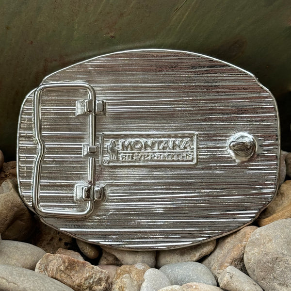 Montana Silversmiths Western Belt Buckle in silver and gold, featuring intricate engravings and a prominent 'T' initial - A1047T. Available at Blair's Western Wear, Marble Falls, TX.