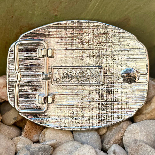 Montana Silversmiths Belt Buckle in silver and gold, featuring detailed engravings and filigree embellishments with a central gold initial - A1047G. Available at Blair's Western Wear, Marble Falls, TX.