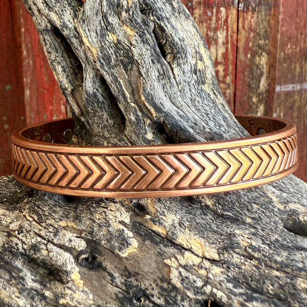 Montana Silversmiths copper cuff bracelet with chevron pattern, crafted from solid copper for natural warmth, with magnetic inner accents for daily balance - BC6285. Available at Blair's Western Wear, Marble Falls, TX.