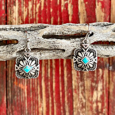 Montana Silversmiths Earrings in Silver, featuring a twisted rope border and intricate filigree design with a central turquoise stone - ER6116. Available at Blair's Western Wear, Marble Falls, TX.
