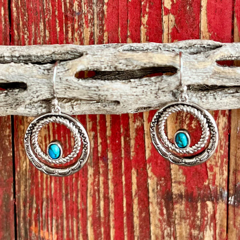 Montana Silversmiths Earrings Circle in turquoise, highlighted by detailed silver filigree and black accents - ER6104. Available at Blair's Western Wear, Marble Falls, TX.