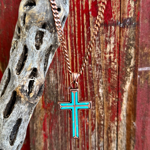 Montana Silversmiths necklace cross with turquoise inlay in copper tone, featuring a secure medium-weight pendant and a tarnish-resistant finish – NC5840. Available at Blair's Western Wear, Marble Falls, TX.