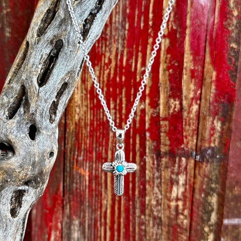 Montana Silversmiths necklace cross feather pendant in silver with turquoise center, featuring a tarnish-resistant rhodium finish and lightweight design – NC4529. Available at Blair's Western Wear, Marble Falls, TX.