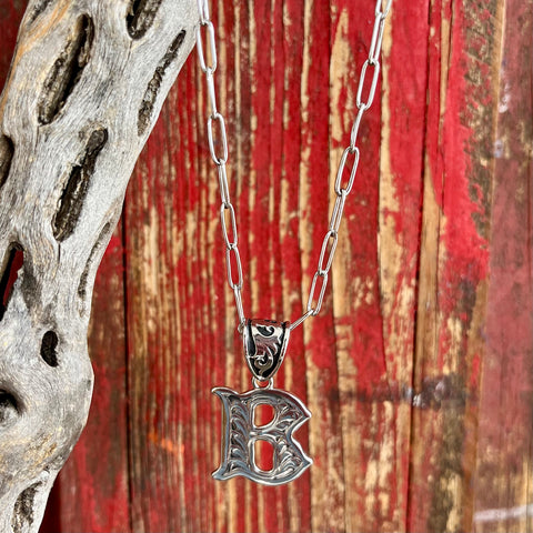 Montana Silversmiths Silver Scroll Necklace featuring an intricately engraved letter "B" pendant, durable rhodium plating, adjustable 18-inch chain, and Montana Armor coating - NC6096B. Available at Blair's Western Wear, Marble Falls, TX.