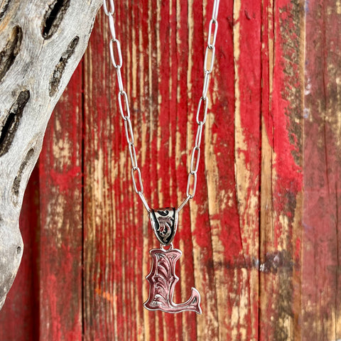 Montana Silversmiths Silver Scroll "L" Initial Necklace featuring an intricate scroll pattern, crafted with a durable silver finish and an adjustable chain for a customized fit - NC6096L. Available at Blair's Western Wear, Marble Falls, TX.
