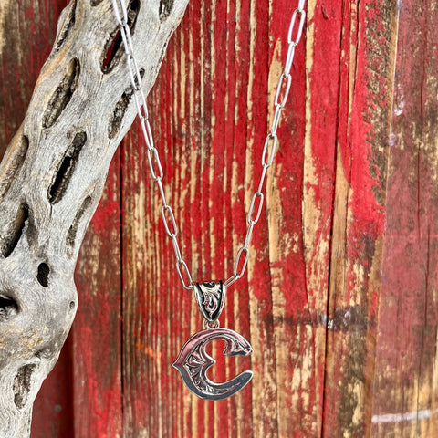 Montana Silversmiths Western Initial Necklace featuring an intricately engraved 'C' initial in antiqued silver-tone finish, with an 18-inch adjustable chain and tarnish-resistant coating - NC6096C. Available at Blair's Western Wear, Marble Falls, TX.