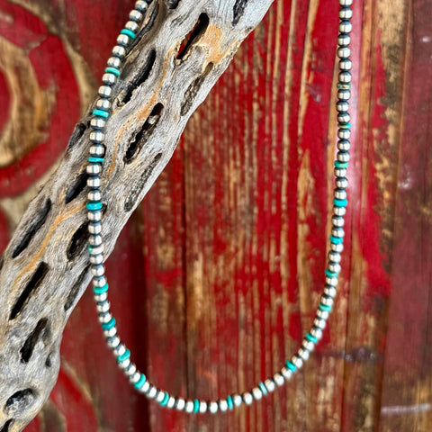 Nizhoni necklace beaded necklace in blue and silver, 4mm sterling silver beads create a classic Navajo-inspired look while providing durable shine, with turquoise heishi bead accent section that adds vibrant Southwestern color - NZNKSMBED. Available at Blair's Western Wear, Marble Falls, TX.