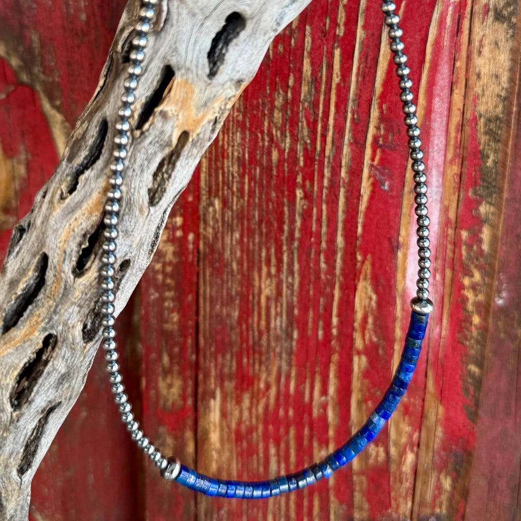 Nizhoni Traders necklace beaded necklace in navy, crafted with rich navy stone heishi beads, with sterling silver bead accents - NKSMBEADNVY. Available at Blair's Western Wear, Marble Falls, TX.