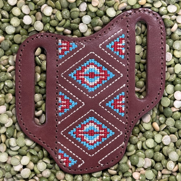 RH Co Leather Sheath in burgundy with multicolor Aztec beading, made from full-grain leather with wide belt slots for secure carrying - 23225882K6. Available at Blair's Western Wear, Marble Falls, TX.