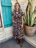 Women's brown and blue retro floral short sleeve midi dress with V-neckline, elasticized waist, tiered skirt, and pockets — Blair's Western Wear Marble Falls TX