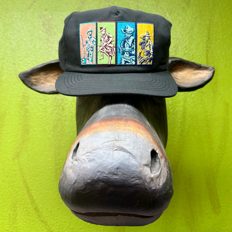 Sendero Cowboy Repeat Pop Art Cap in black, featuring multicolor embroidered cowboy panels, with breathable mesh back and adjustable snapback closure - CAP COWBOY REPEAT. Available at Blair's Western Wear, Marble Falls, TX.