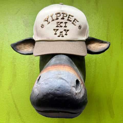 Sendero Provisions Co. cap Yippee Ki Yay hat in cream and brown, with embroidered lettering for Western flair, and an adjustable snapback closure for a custom fit - YIPPEETN. Available at Blair's Western Wear, Marble Falls, TX.