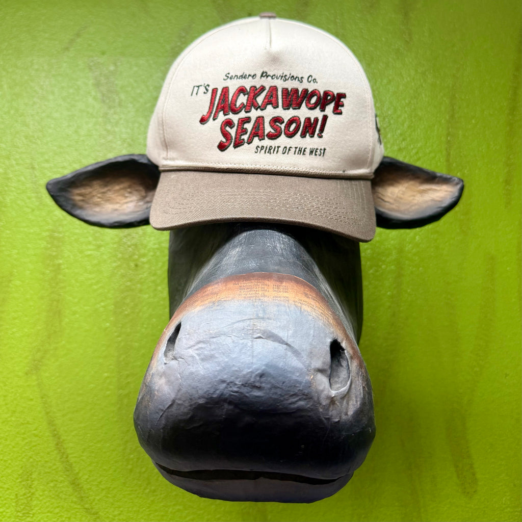 Sendero Provisions Co. Cap Jackawope Season in Cream/Brown, made from durable cotton twill for breathable comfort, with adjustable snapback closure for a secure fit - JACKAWOPE. Available at Blair's Western Wear, Marble Falls, TX.