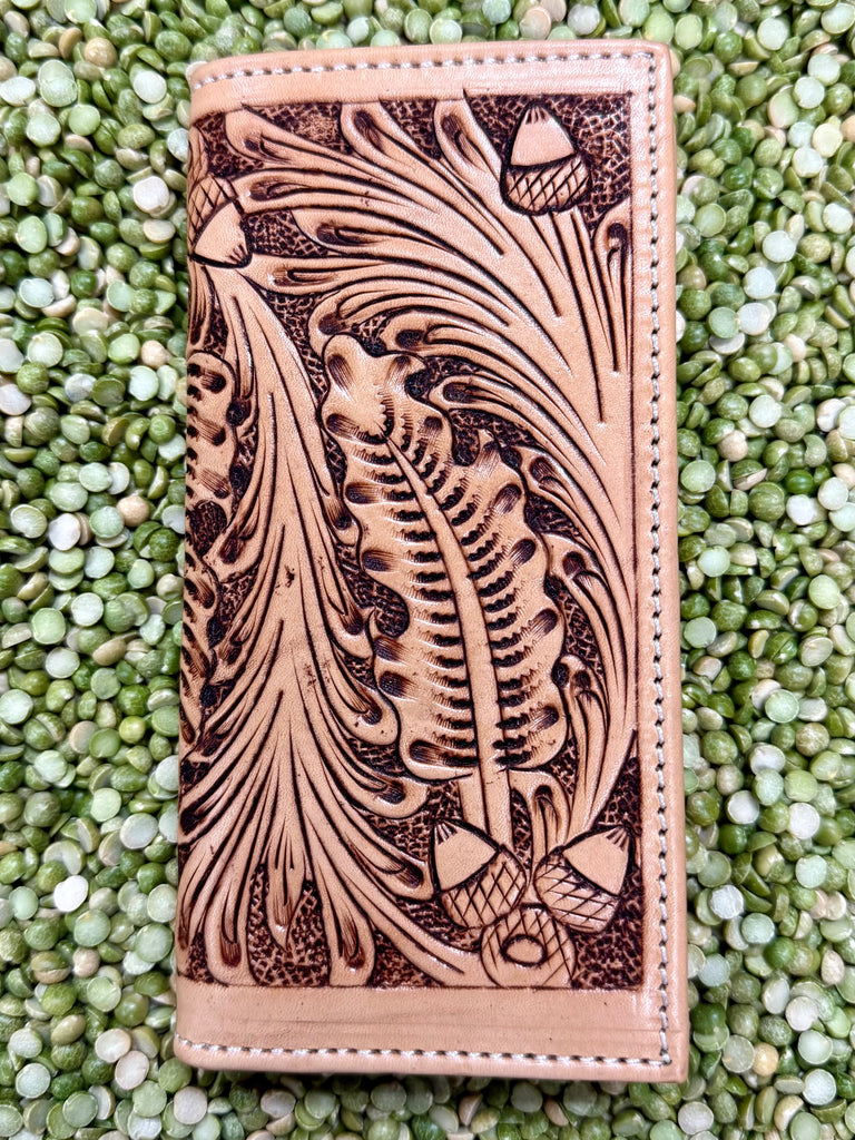 Tackrus Challenger checkbook tooled floral wallet in natural leather, hand-tooled floral and acorn pattern, with multiple card slots and a clear ID window - 18RSW60R. Available at Blair's Western Wear, Marble Falls, TX.