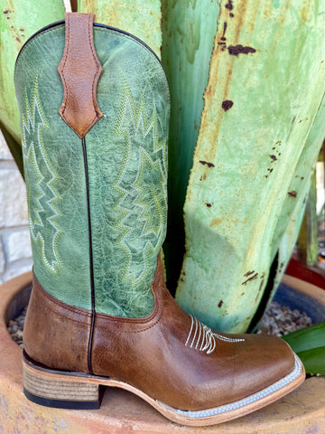 Teen Corral western boot with brown leather foot and green stitched shaft, full-grain leather construction, wide square toe for extra room, leather sole with rubber heel cap – T0220. Available at Blair’s Western Wear, Marble Falls, TX.
