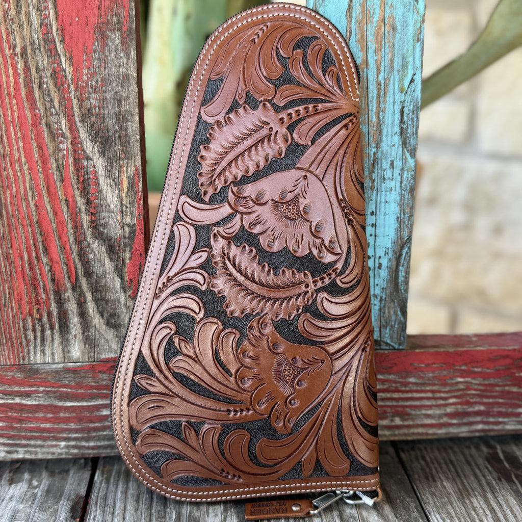 Unisex Tooled Leather Gun Case in brown and black, intricately tooled floral leather with soft quilted lining - GCO3CBG. Available at Blair's Western Wear, Marble Falls, TX.