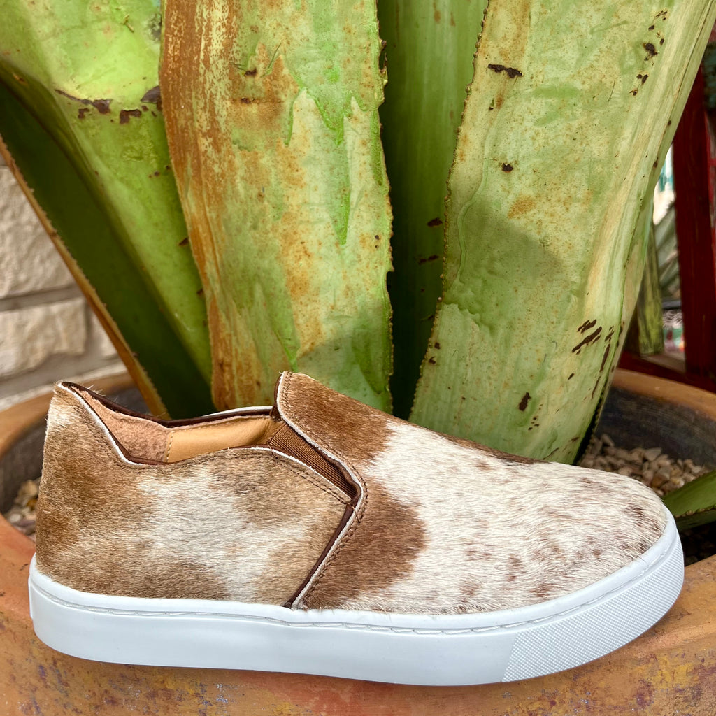 Women’s Agave Sky Cowhide Slip-On Sneakers in Salt & Pepper, featuring authentic cowhide upper with elastic side panels, and cushioned insole for comfort - UTAH. Available at Blair's Western Wear, Marble Falls, TX.