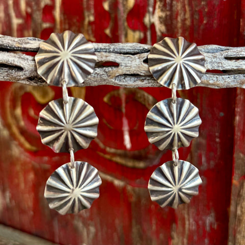 Women’s Alzuni silver dangle circle earrings with stamped sunburst discs, featuring lightweight movement and oxidized detailing – ALDNGLER. Available at Blair's Western Wear, Marble Falls, TX.