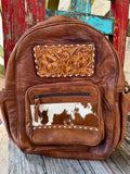 Women’s American Darling backpack leather hide backpack in brown, crafted from full-grain leather for everyday durability, with hand-tooled floral leather detailing for Western style - ADBG600. Available at Blair's Western Wear, Marble Falls, TX.
